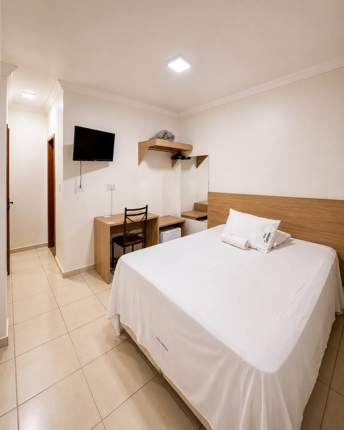 Suíte com ar-condicionado do Hotel Carreiro, hotel em Inhapim MG