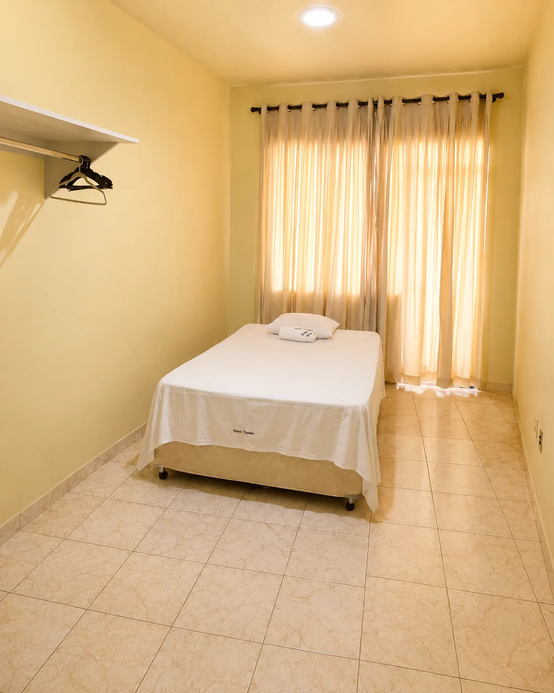 Quarto com banheiro compartilhado do Hotel Carreiro, hotel em Inhapim MG